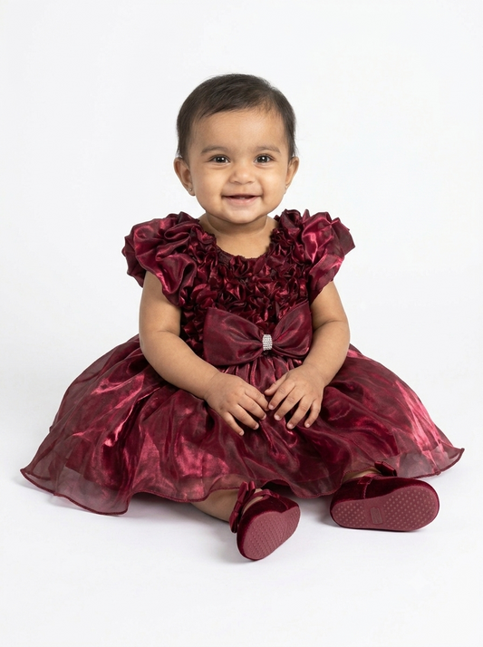 Elegant Shimmering Burgundy Party Dress with Structured Bow Detail